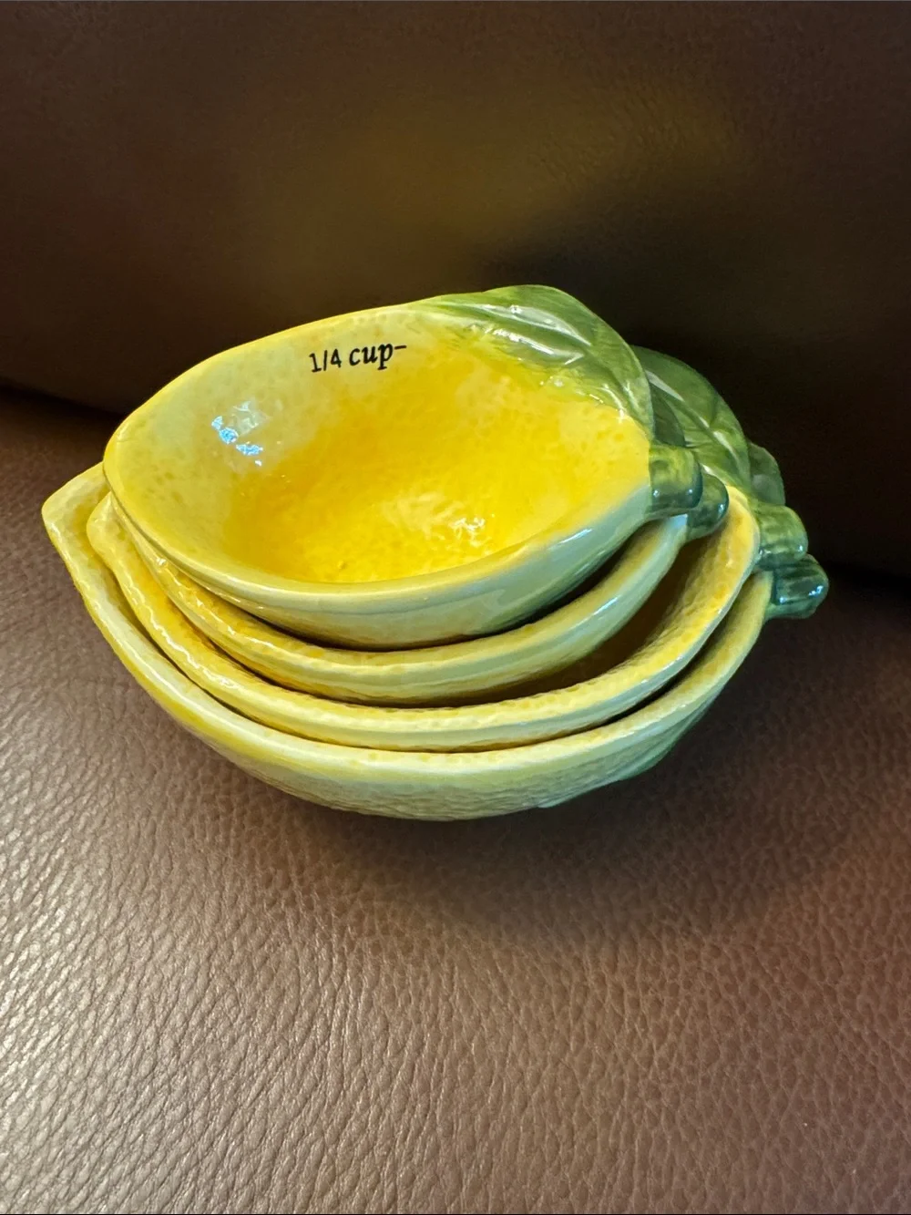 Lemon shaped nesting measuring cups